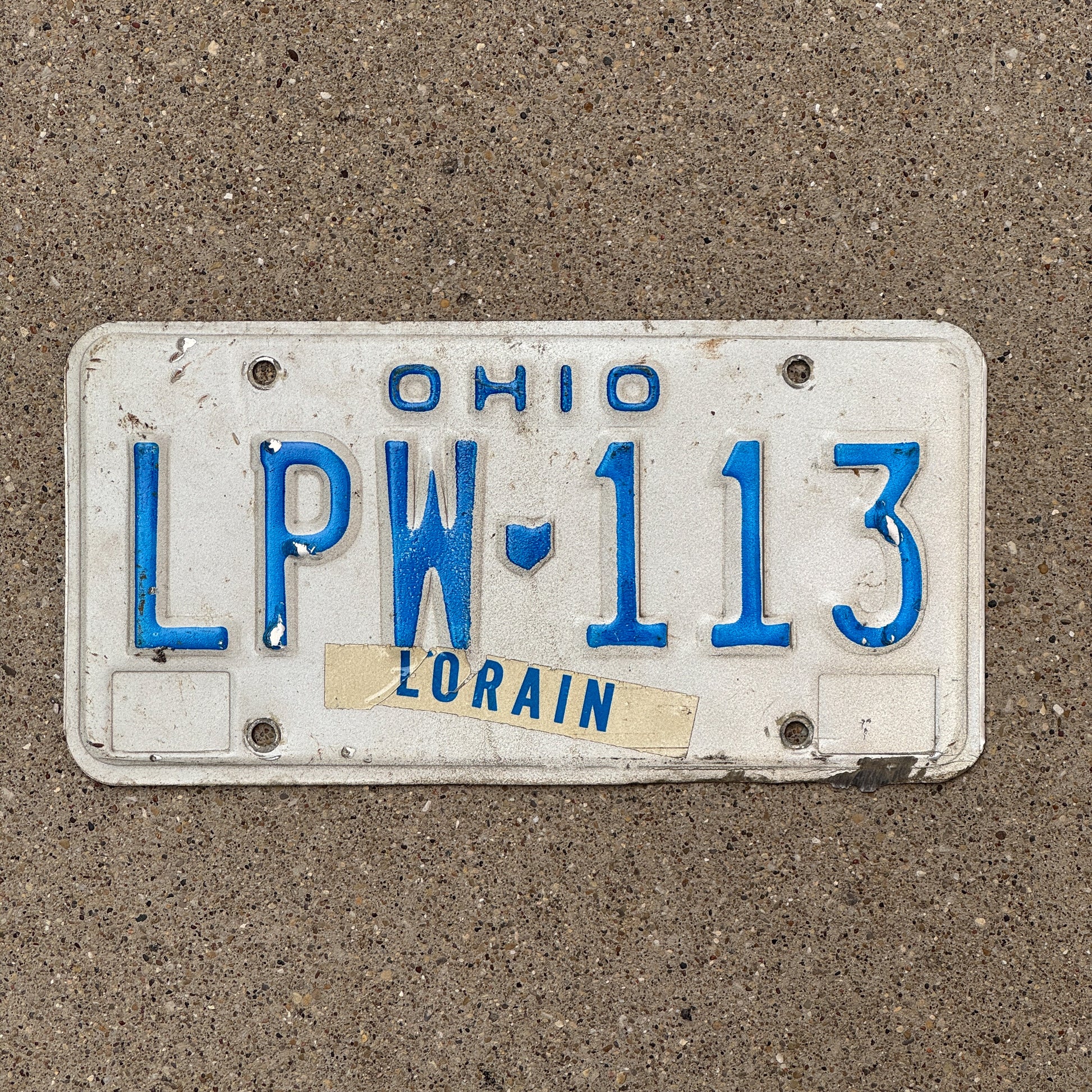 Photo of a 1980 Ohio License Plate Auto Tag 2 Vintage Garage LPW 113 with original patina