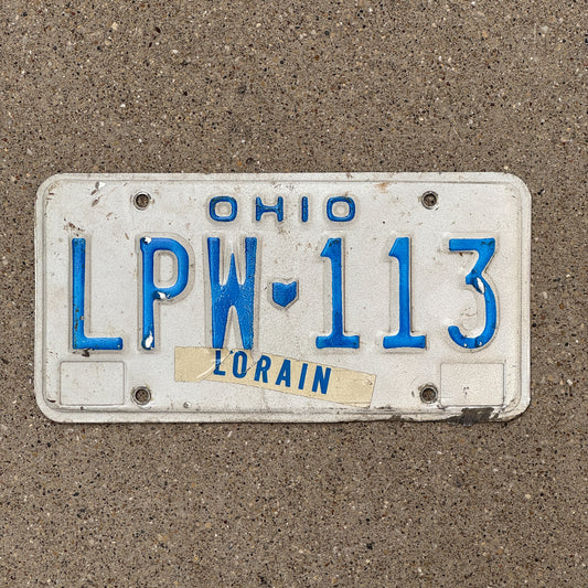 Photo of a 1980 Ohio License Plate Auto Tag 2 Vintage Garage LPW 113 with original patina
