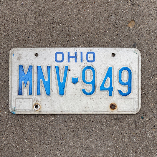 Photo of a 1980 Ohio License Plate Auto Tag 2 Vintage Garage MNV 949 with original patina