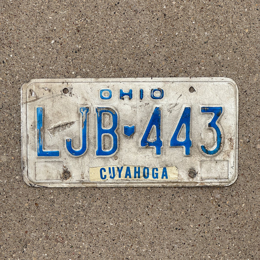 Photo of a 1980 Ohio License Plate Auto Tag Garage Decor Vintage LJB 443 with original patina