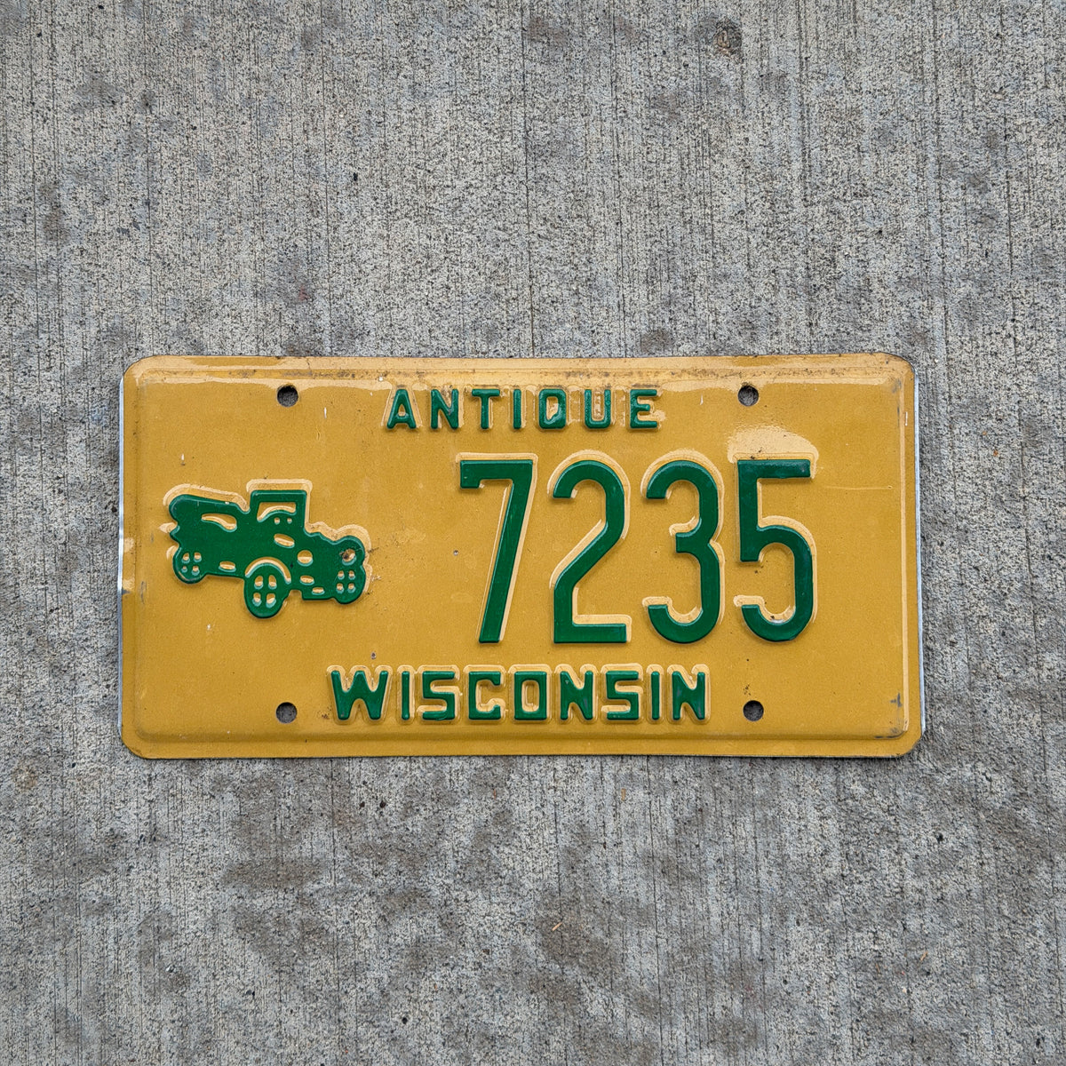 Photo of a 1980 Wisconsin Antique Vehicle License Plate Auto Tag 1 Vintage Garage 7235 with original patina