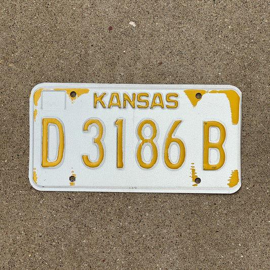 Photo of a 1980s 1990s Kansas Dealer Error License Plate Auto Tag Garage Decor Vintage Misprint D 3186 B