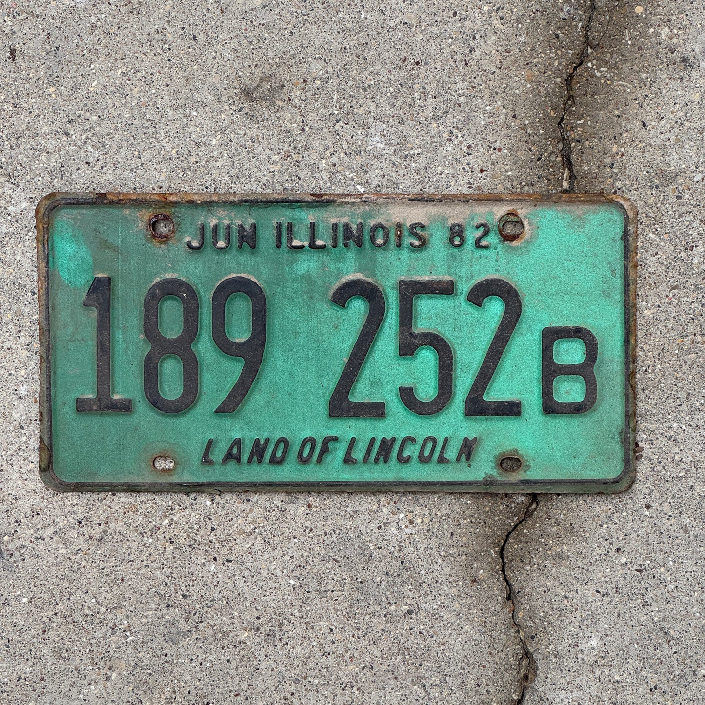 Photo of a 1981 1982 Illinois Truck License Plate Auto Tag Garage Decor Vintage 189 252 B with original patina
