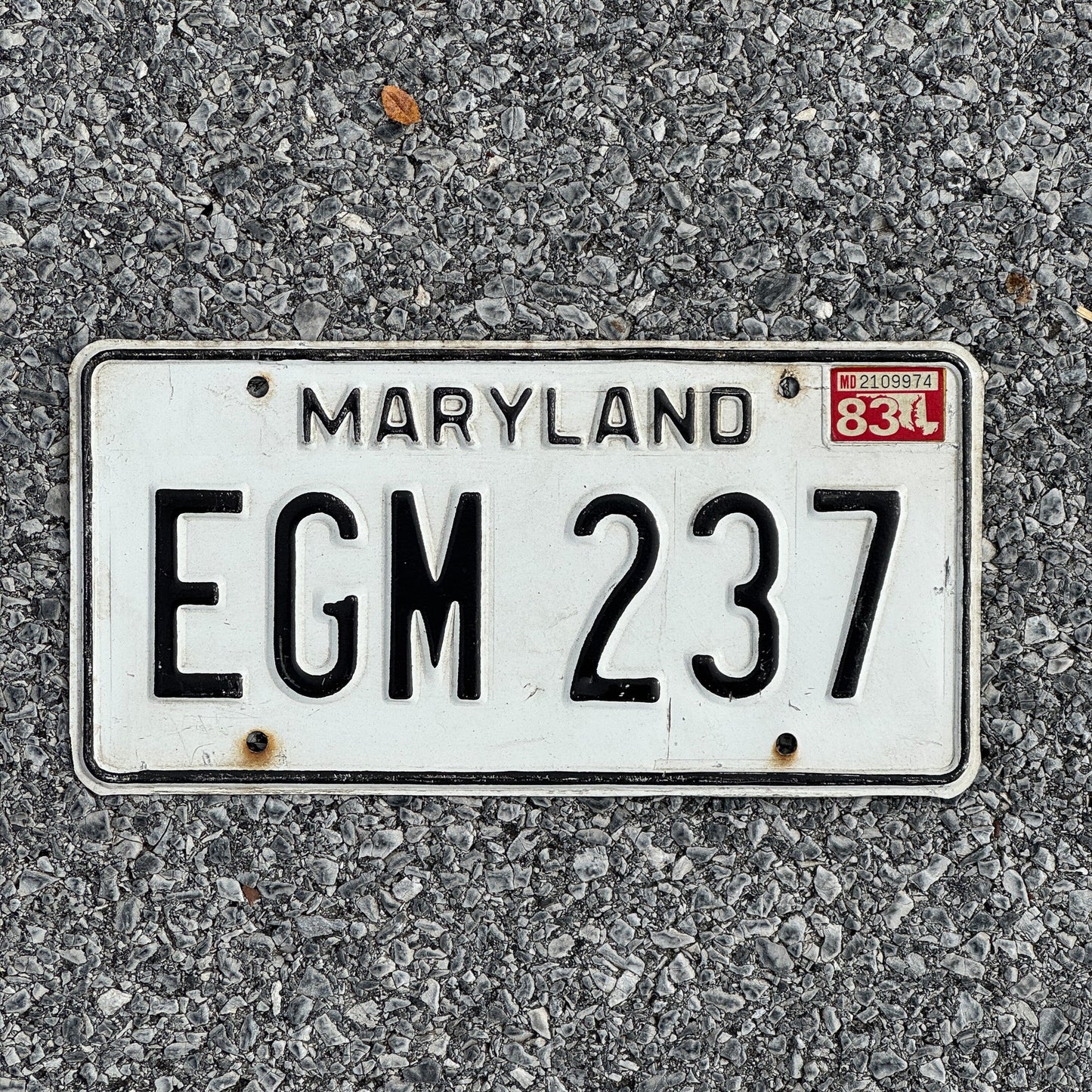 Photo of a 1981 1983 Maryland License Plate Auto Tag Garage Decor Vintage EGM 237