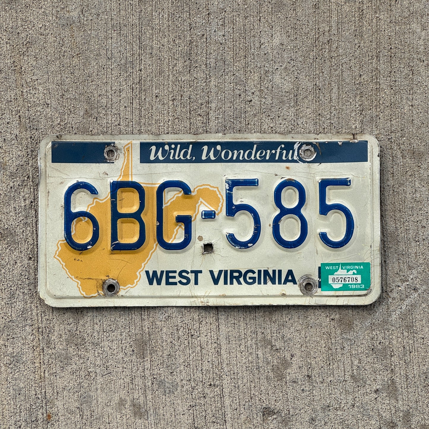 Photo of a 1981 1983 West Virginia License Plate Auto Tag Garage Decor Vintage 6 BG 585 with original patina