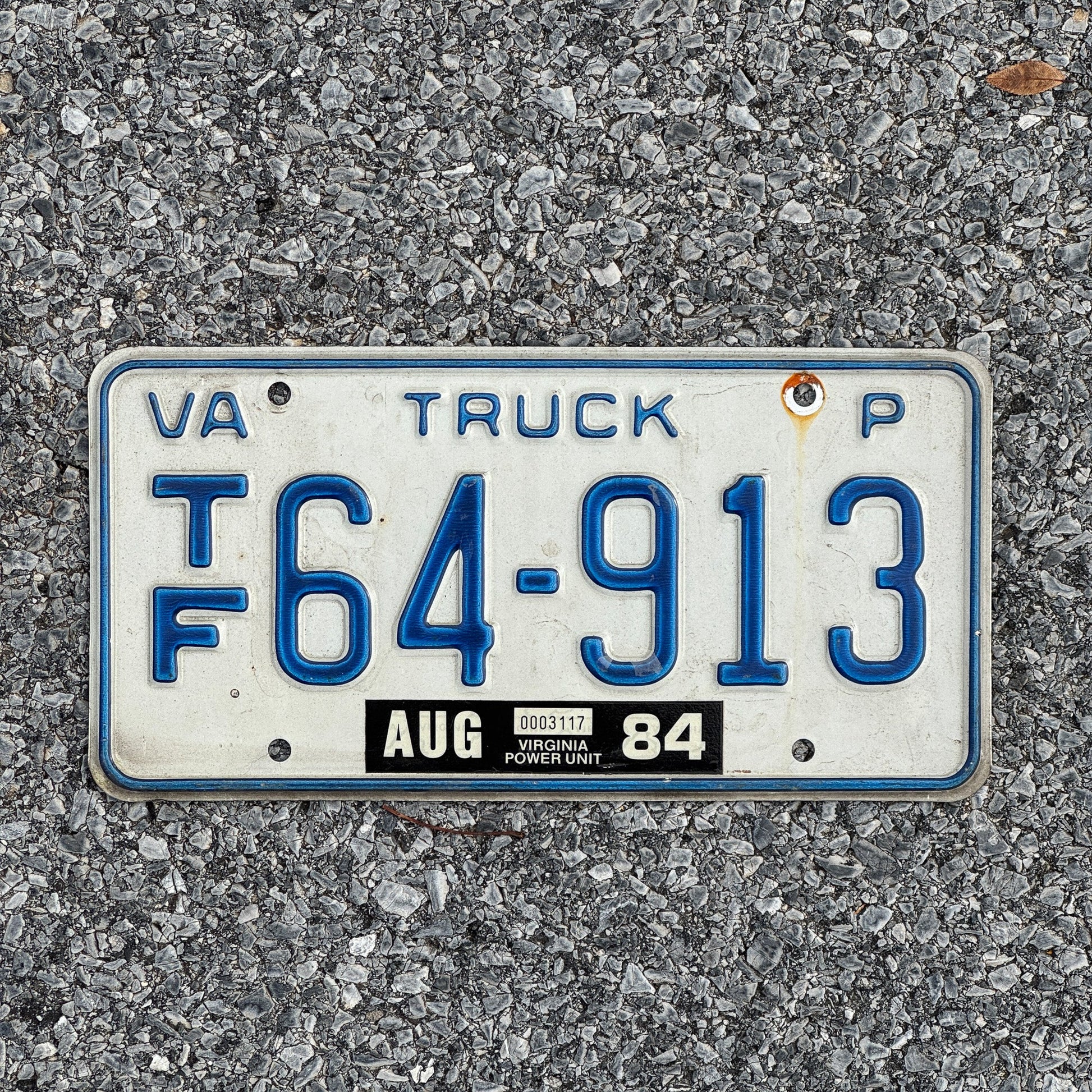 Photo of a 1981 1984 Virginia Truck License Plate Auto Tag Garage Decor Vintage TF 64 913