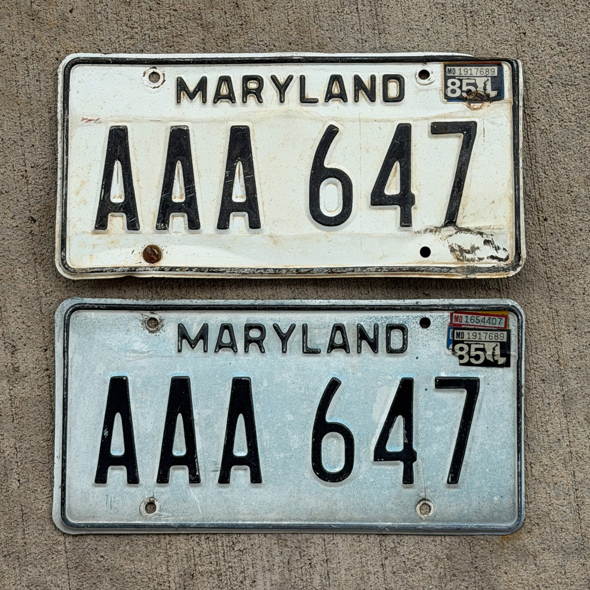 Photo of a 1981 1985 Maryland License Plate Pair Auto Tag Garage Decor Vintage Repeat Repeating Beginning of Series AAA 647 with original patina