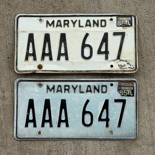 Photo of a 1981 1985 Maryland License Plate Pair Auto Tag Garage Decor Vintage Repeat Repeating Beginning of Series AAA 647 with original patina