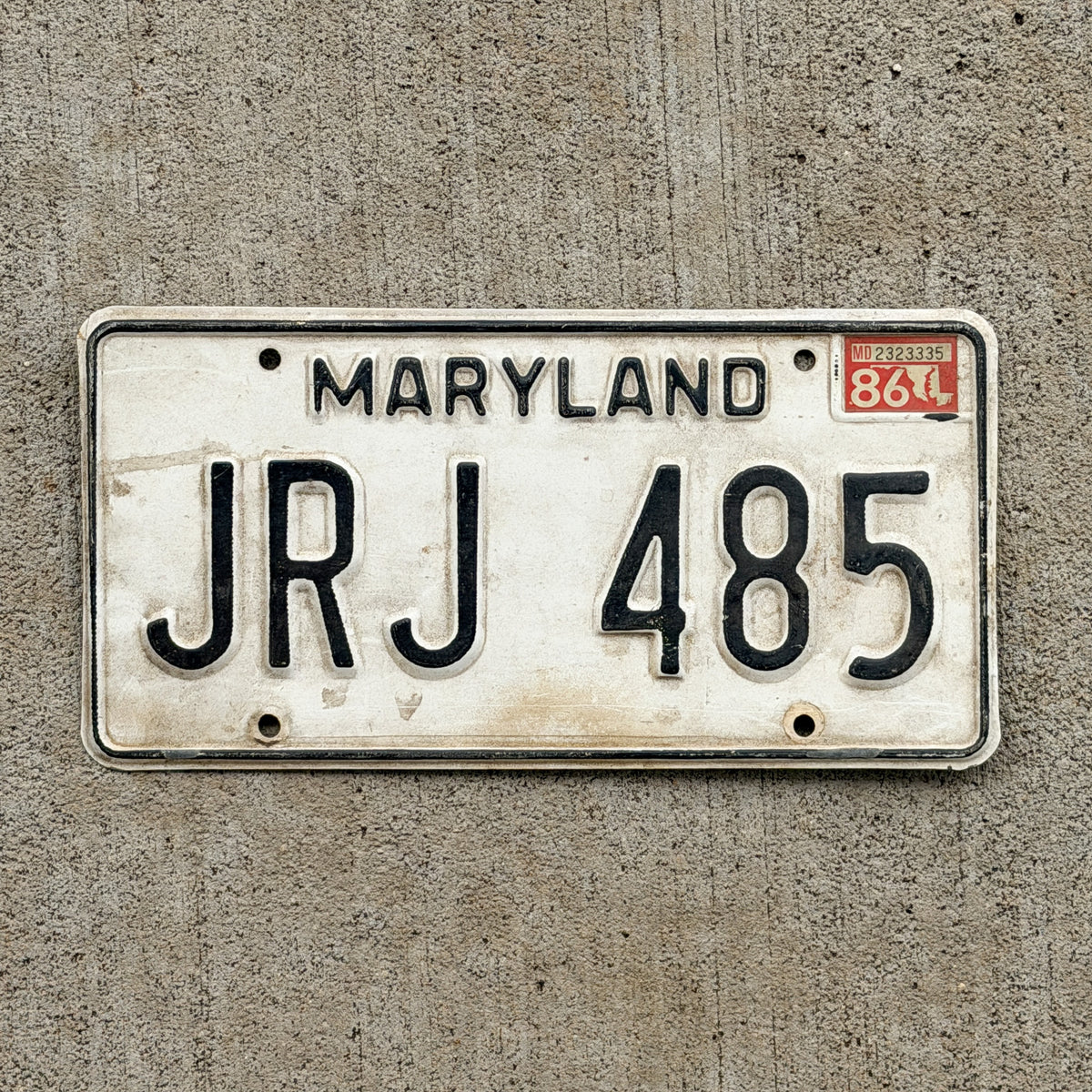 Photo of a 1981 1986 Maryland License Plate Auto Tag Garage Decor Vintage JRJ 485 with original patina