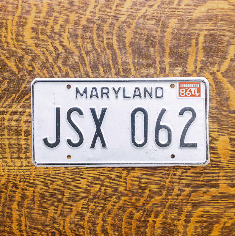 Photo of a 1981 1986 Maryland License Plate Auto Tag Garage Decor Vintage JSX 062 with original patina