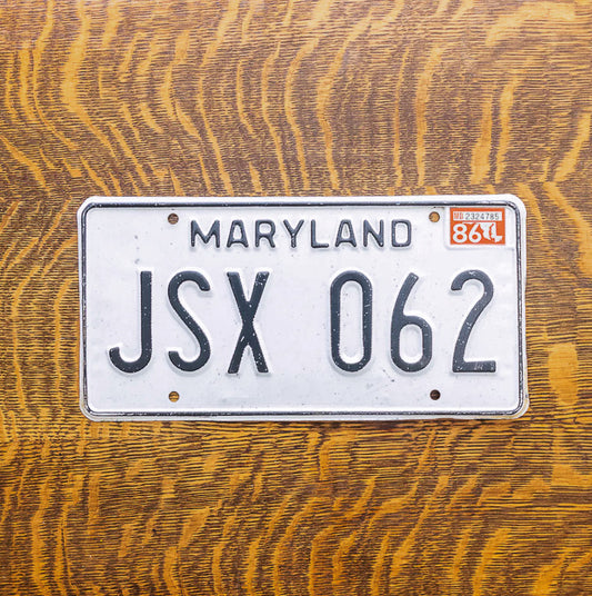Photo of a 1981 1986 Maryland License Plate Auto Tag Garage Decor Vintage JSX 062 with original patina