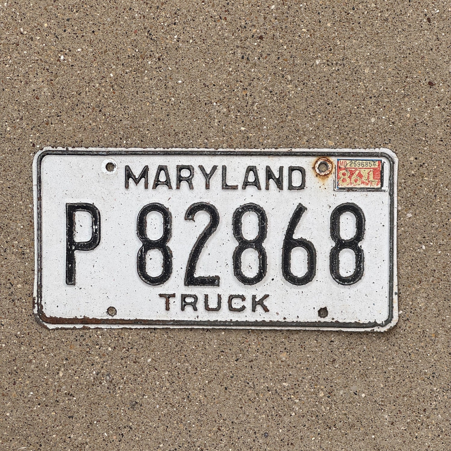 Photo of a 1981 1986 Maryland Truck License Plate Auto Tag Garage Decor Vintage P 82868