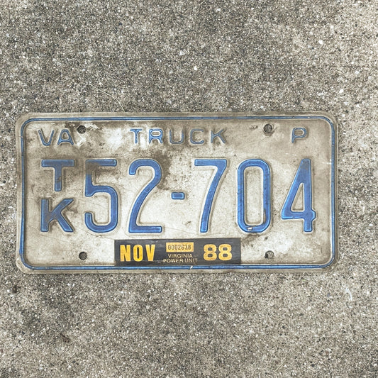 Photo of a 1981 1988 Virginia Truck License Plate Auto Tag Garage Decor Vintage 52 704 with original patina