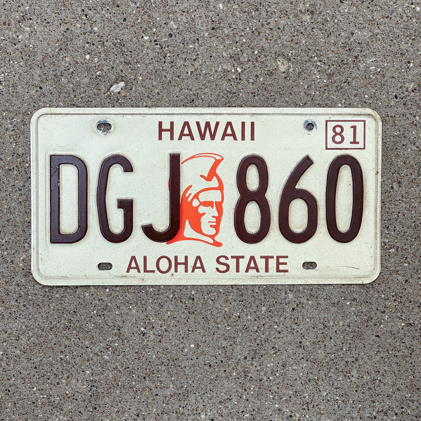 Photo of a 1981 Hawaii License Plate Auto Tag Garage Decor Vintage Kamehameha Base DGJ 860 with original patina