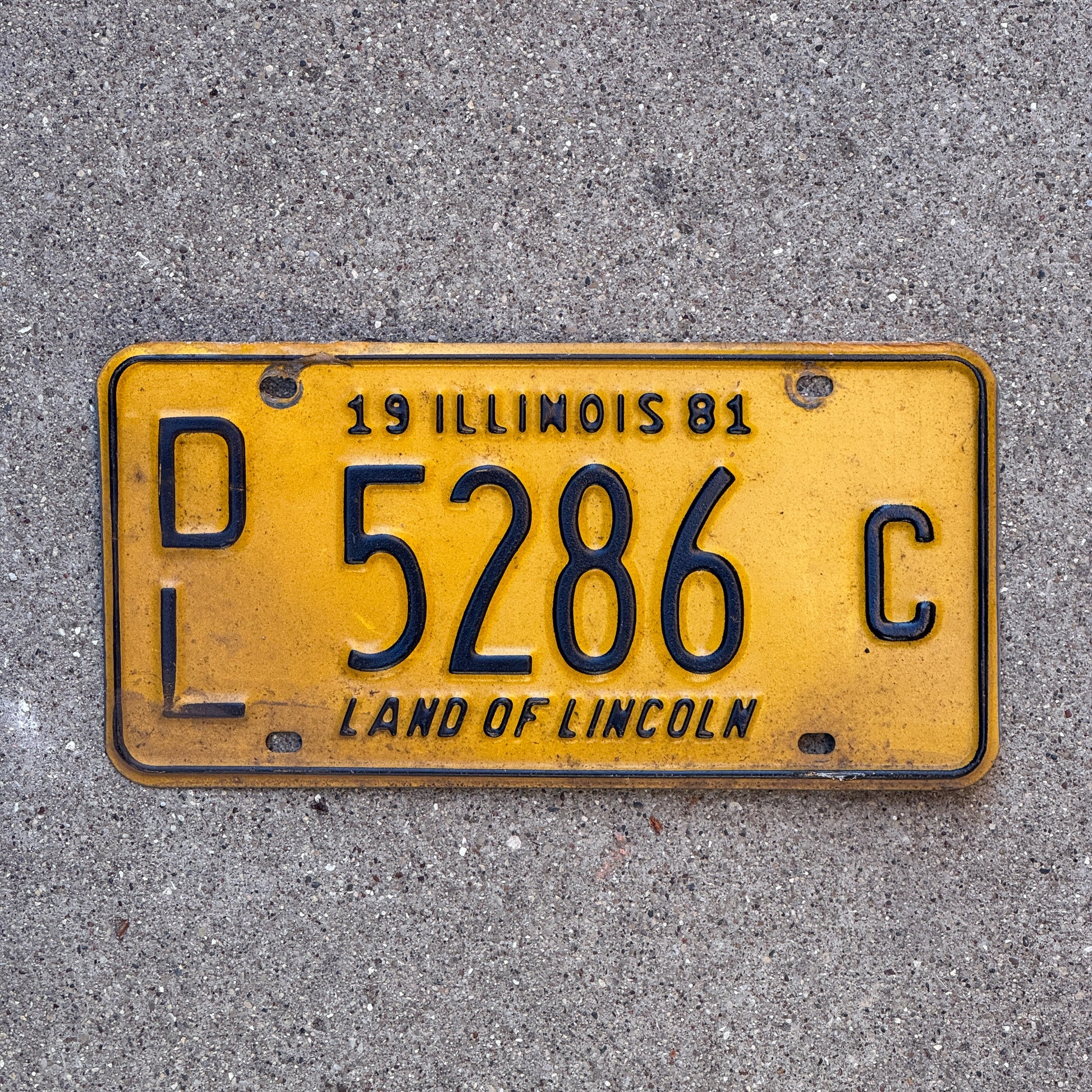 Photo of a 1981 Illinois Dealer License Plate Auto Tag 1 Vintage Garage 5286 C with original patina