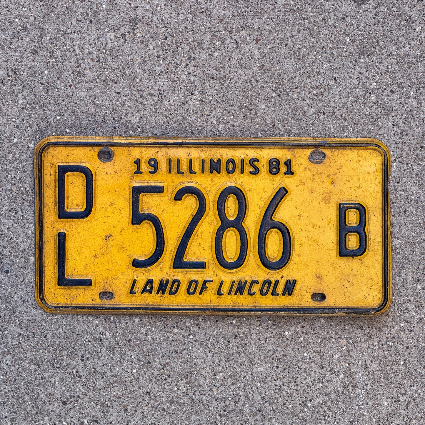 Photo of a 1981 Illinois Dealer License Plate Auto Tag 2 Vintage Garage 5286 B with original patina