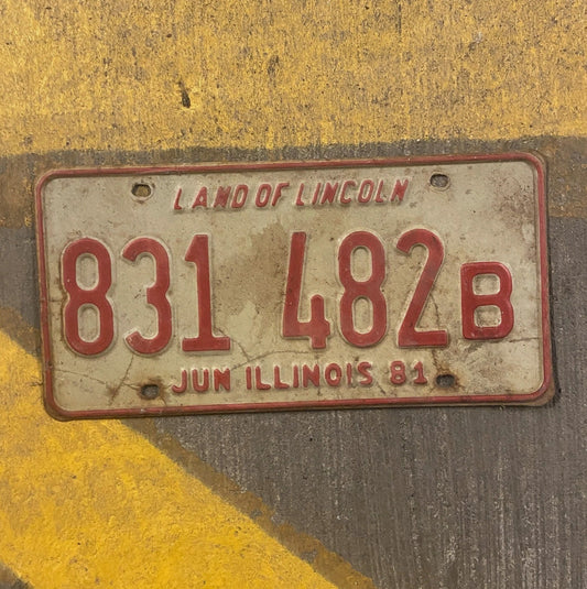 Photo of a 1981 Illinois Truck License Plate Auto Tag Garage Decor Vintage 831 482 B