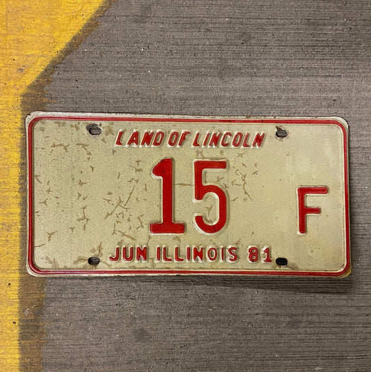 Photo of a 1981 Illinois Truck License Plate Auto Tag Garage Decor Vintage Low Number Two Digit 15 F with original patina