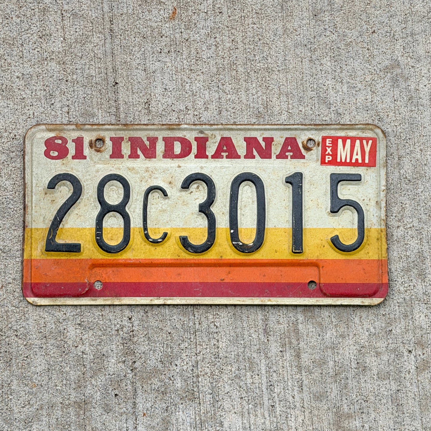 Photo of a 1981 Indiana License Plate Auto Tag Garage Decor Vintage 28 C 3015 with original patina