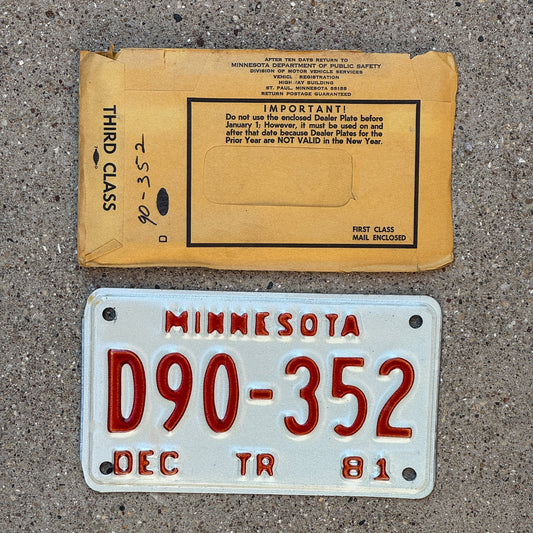 Photo of a 1981 Minnesota Trailer Dealer License Plate Auto Tag Garage Decor Vintage with Envelope D90 352
