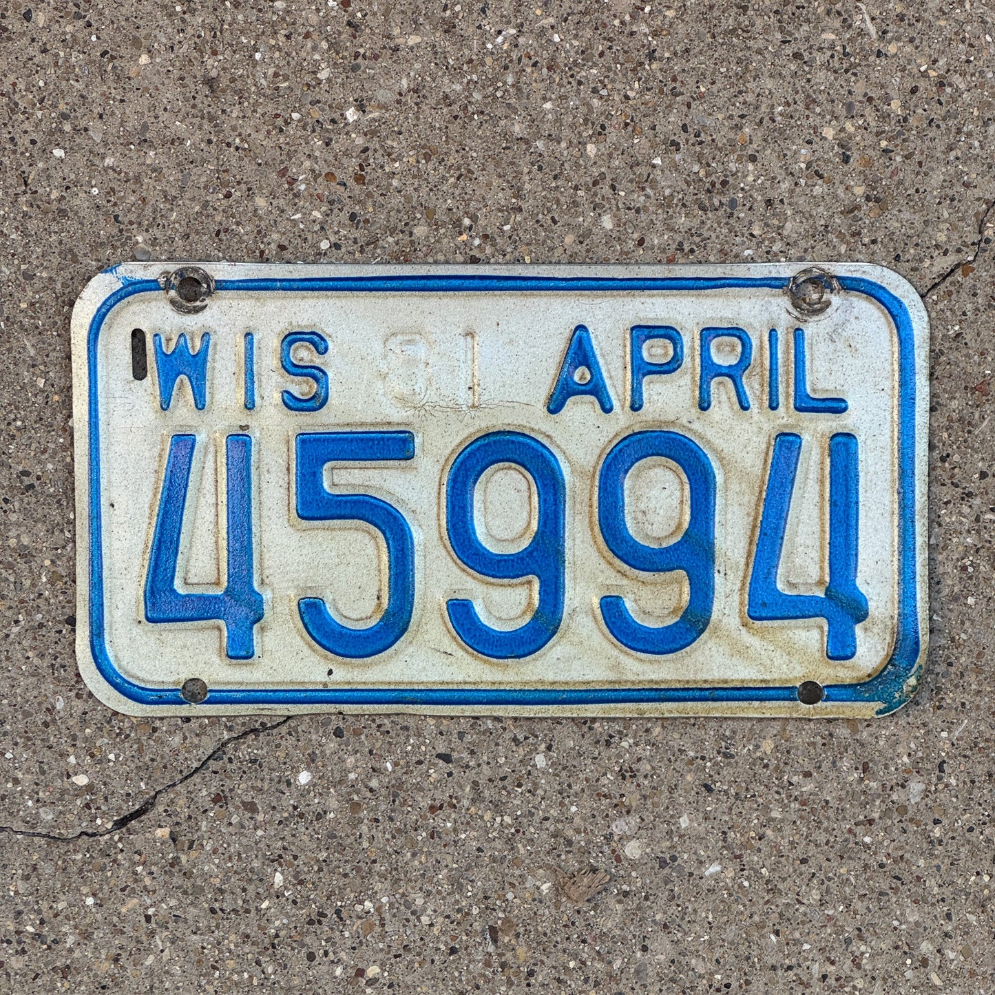Photo of a 1981 Wisconsin Motorcycle License Plate Auto Tag Garage Decor Vintage 45994 with original patina