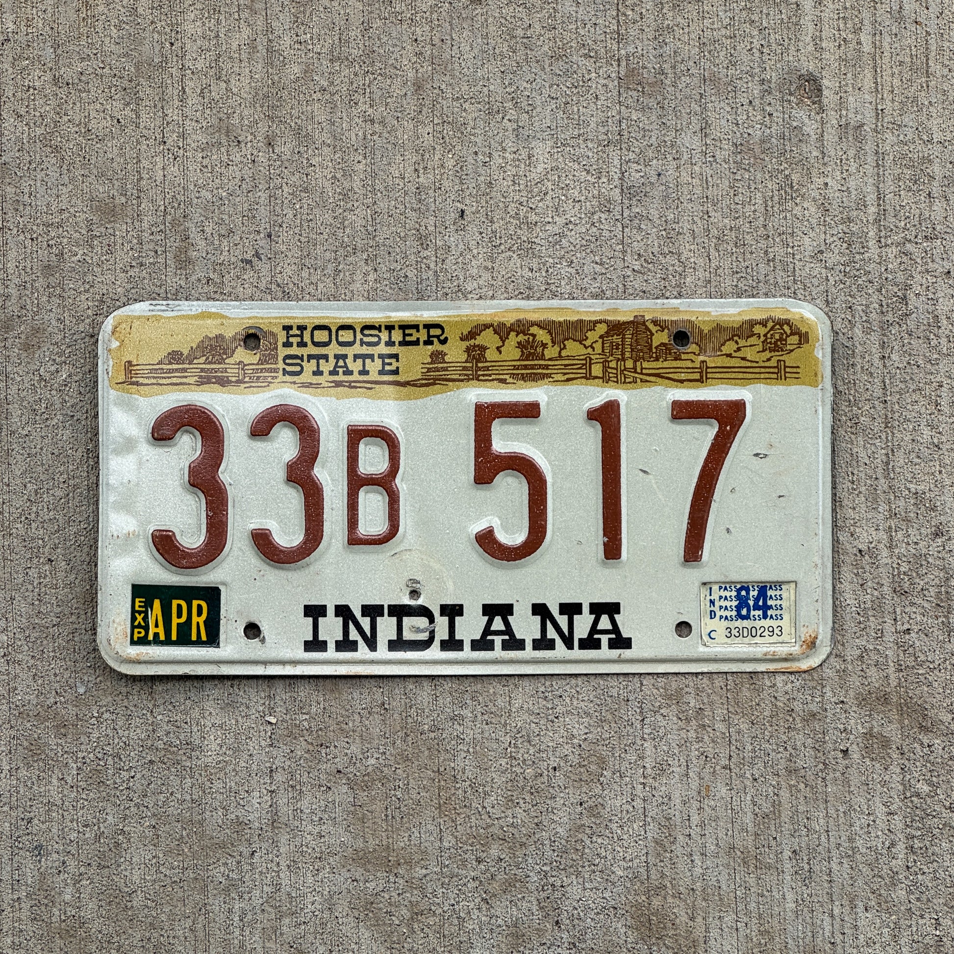 Photo of a 1982 1984 Indiana License Plate Auto Tag Garage Decor Vintage 33 B 517 with original patina