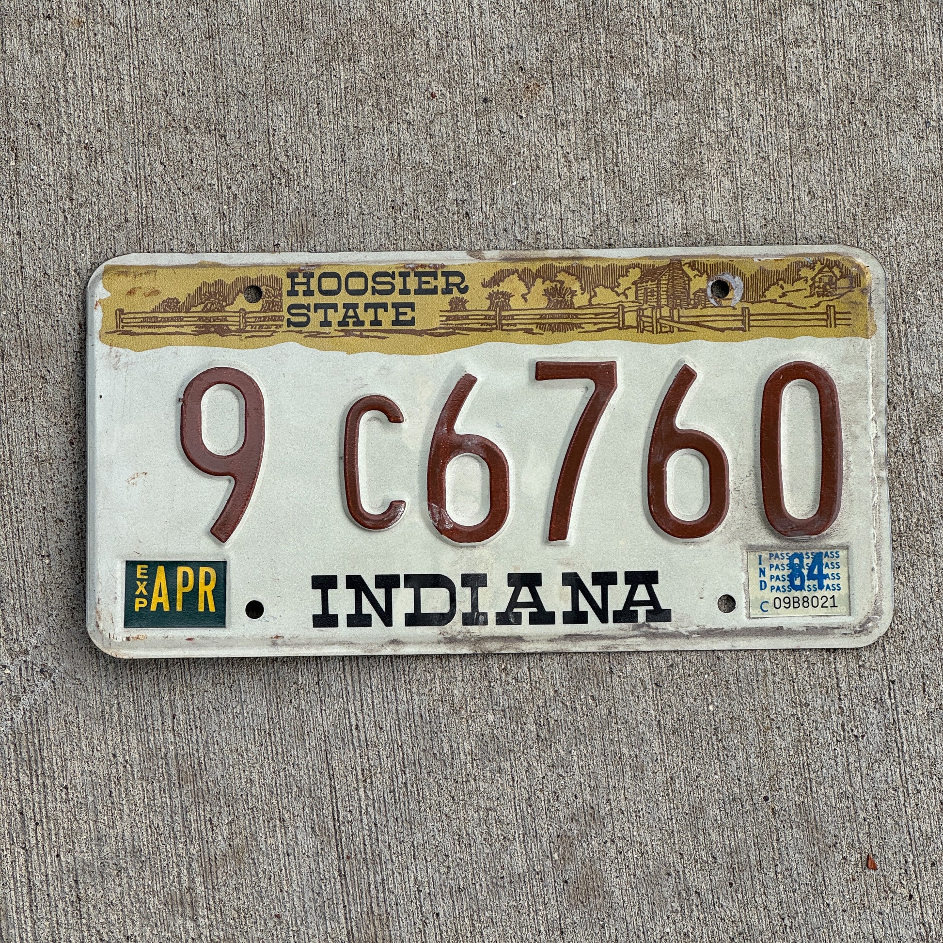 Photo of a 1982 1984 Indiana License Plate Auto Tag Garage Decor Vintage 9 C 6760 with original patina