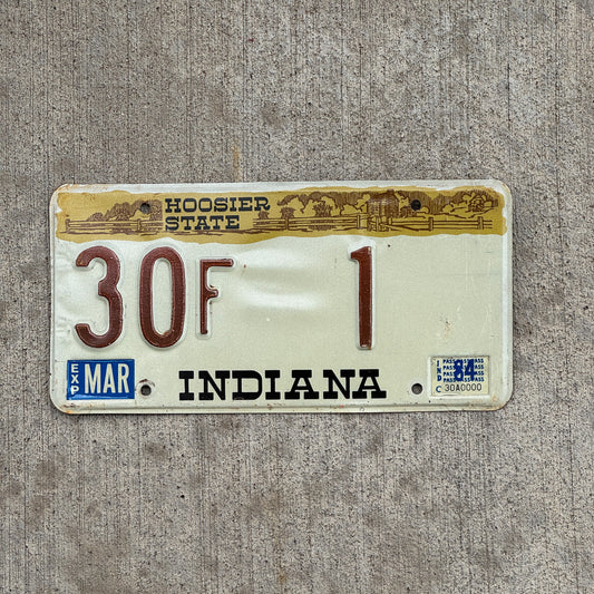 Photo of a 1982 1984 Indiana License Plate Auto Tag Garage Decor Vintage Hancock County Low Number 30 F 1 with original patina