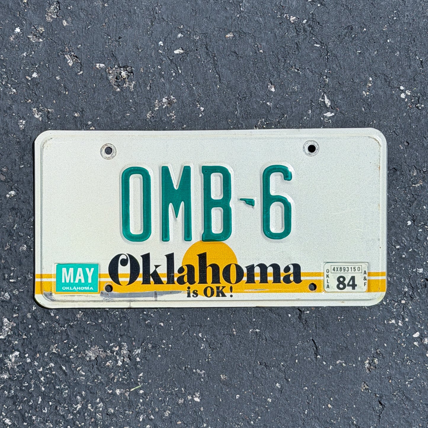 Photo of a 1982 1984 Oklahoma License Plate Auto Tag Garage Decor Vintage OMB 6 with original patina