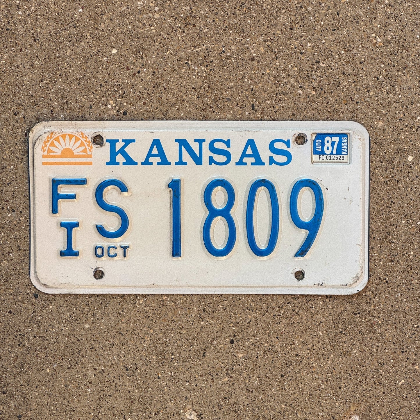 Photo of a 1982 1987 Kansas License Plate Auto Tag Garage Decor Vintage FIS 1809
