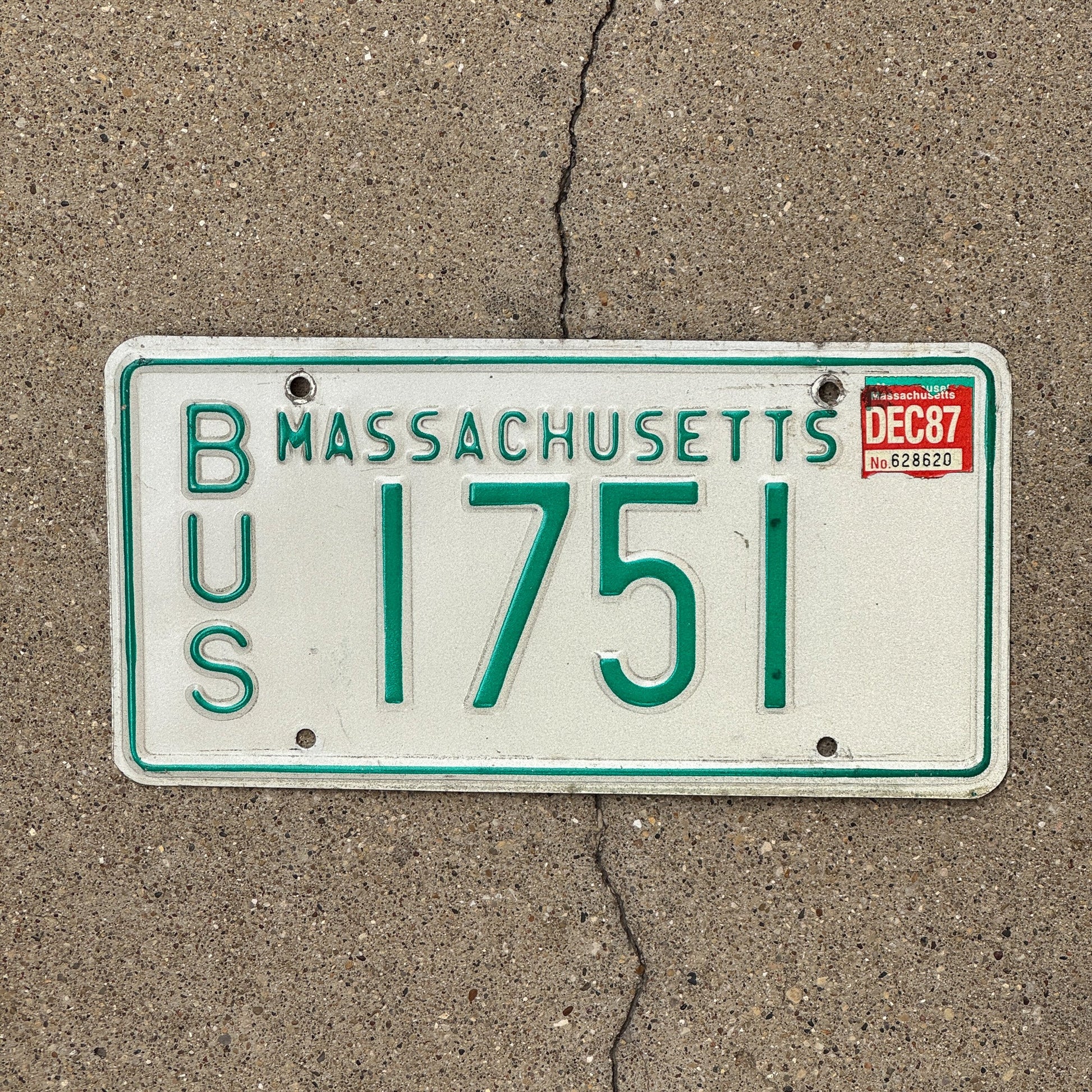 Photo of a 1982 1987 Massachusetts Bus License Plate Auto Tag Garage Decor Vintage 1751