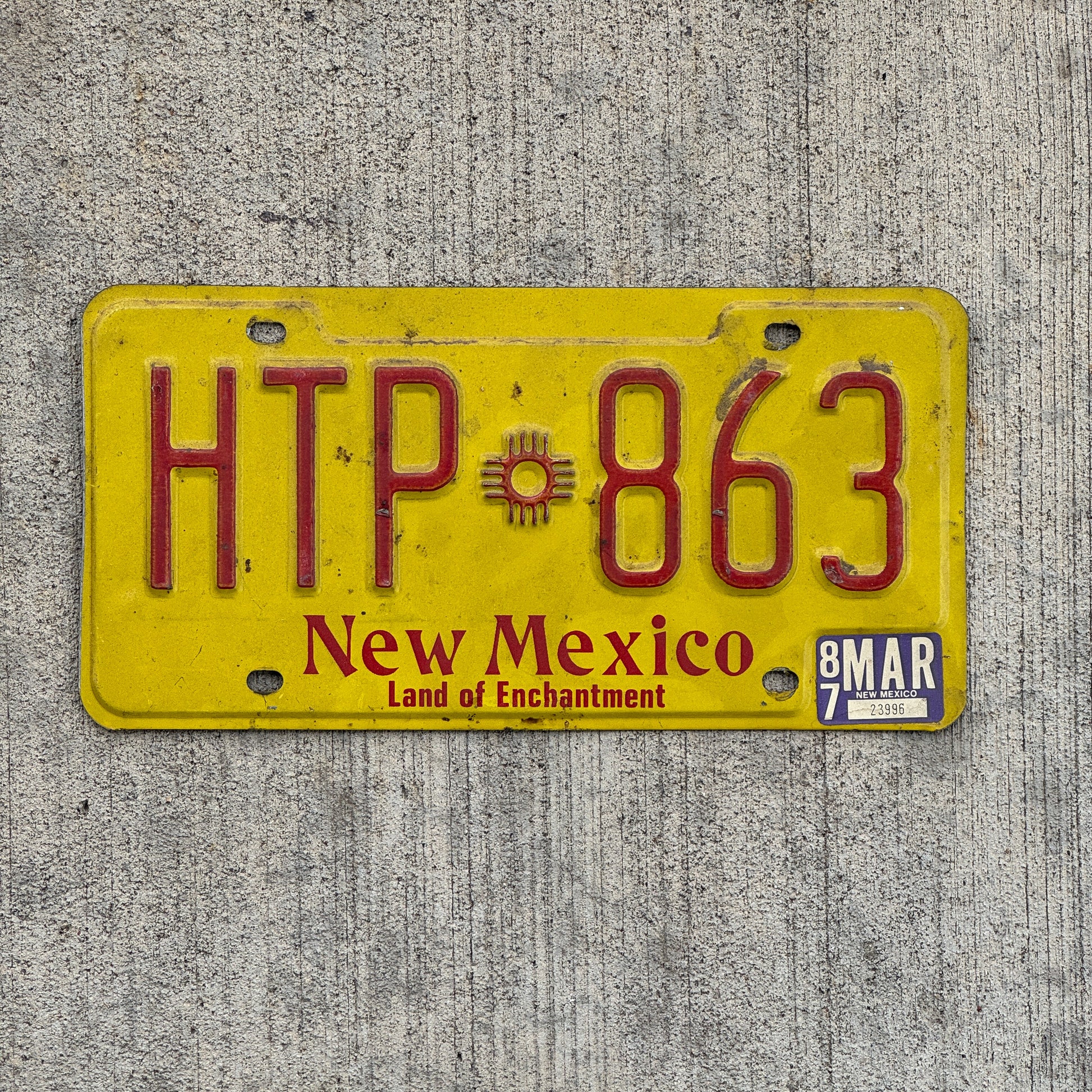 Photo of a 1982 1987 New Mexico License Plate Auto Tag Garage Decor Vintage HTP 863 with original patina
