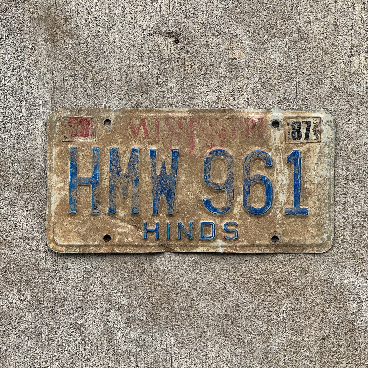 Photo of a 1982 1988 Mississippi License Plate Auto Tag Garage Decor Vintage HMW 961 with original patina
