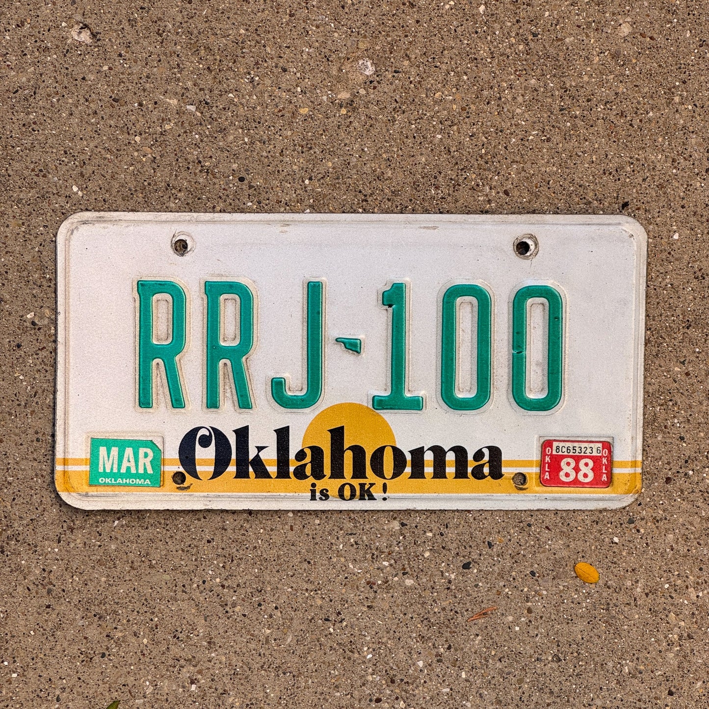 Photo of a 1982 1988 Oklahoma License Plate Auto Tag Garage Decor Vintage RRJ 100 with original patina
