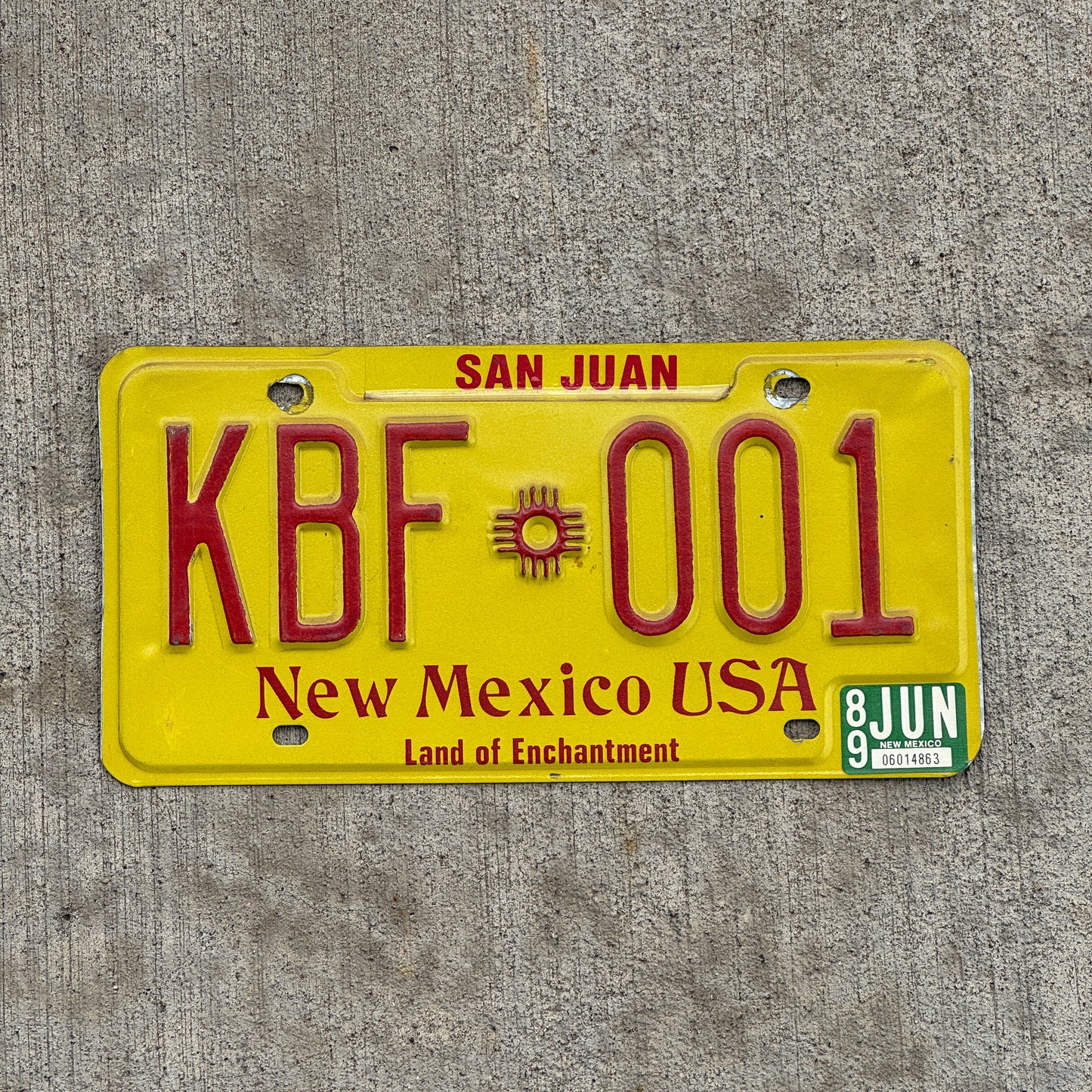 Photo of a 1982 1989 New Mexico License Plate Auto Tag Garage Decor Vintage KBF 001 with original patina