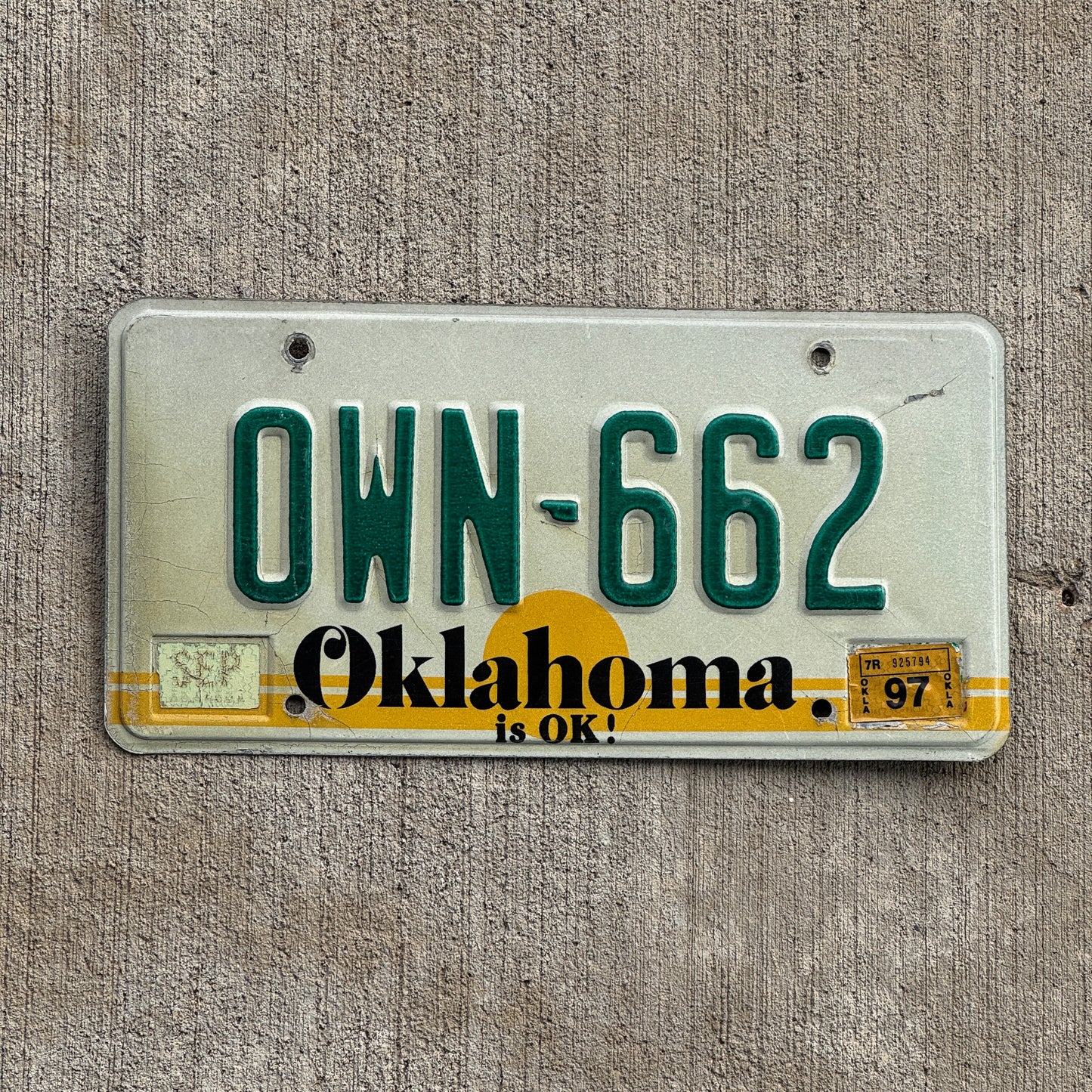 Photo of a 1982 1997 Oklahoma License Plate Auto Tag Garage Decor Vintage OWN 662 with original patina