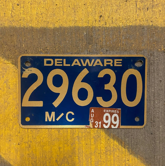 Photo of a 1982 1999 Delaware Motorcycle License Plate Auto Tag Garage Decor Vintage 29630 with original patina