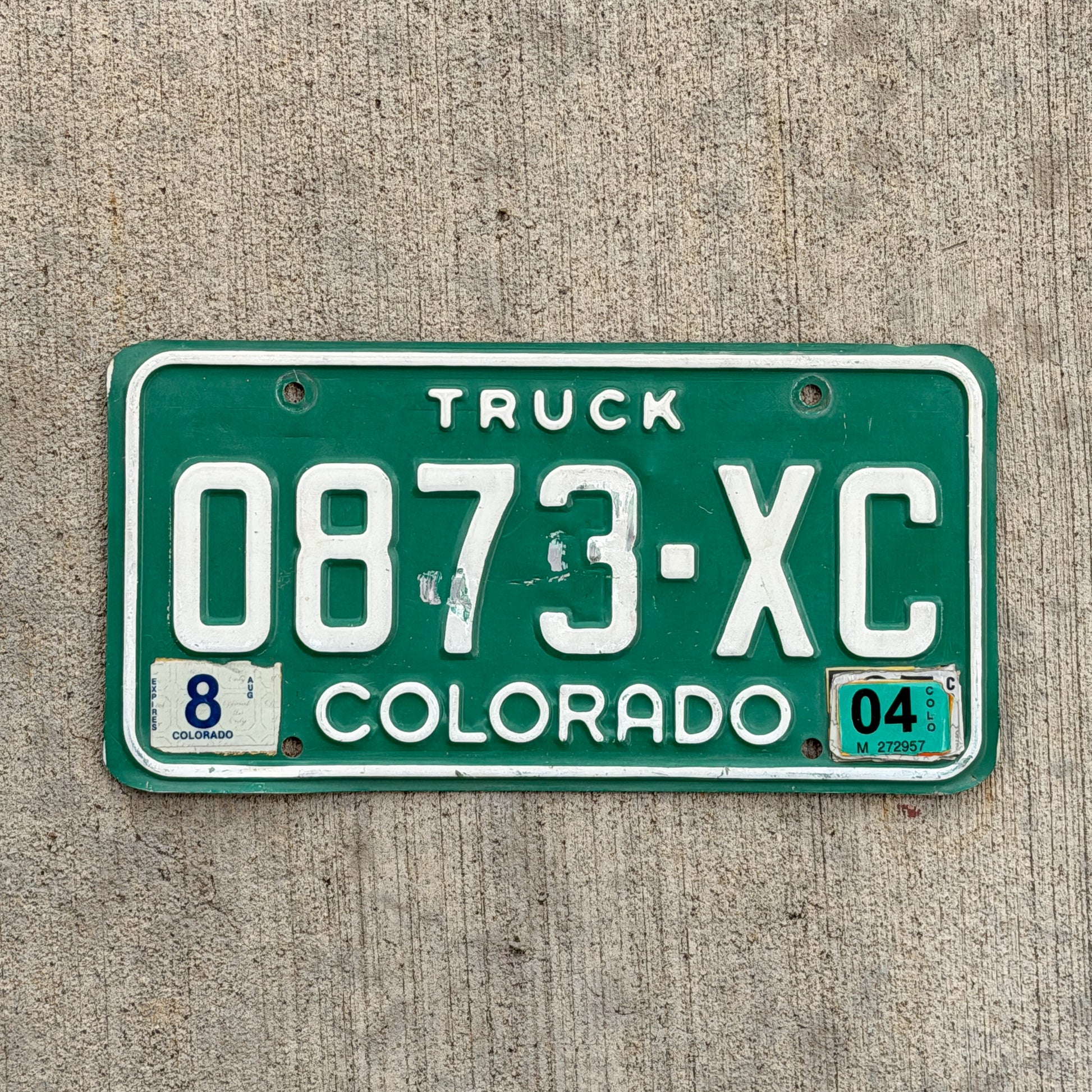 Photo of a 1982 2004 Colorado Truck License Plate Auto Tag Garage Decor Vintage 0873 XC with original patina