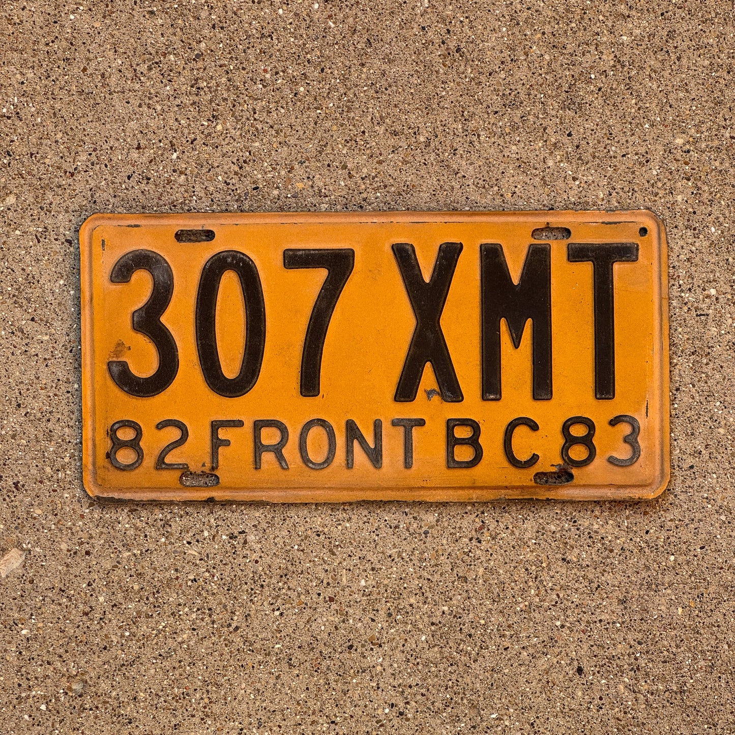 Photo of a 1982 Baja California License Plate Auto Tag Garage Decor Vintage 307 XMT