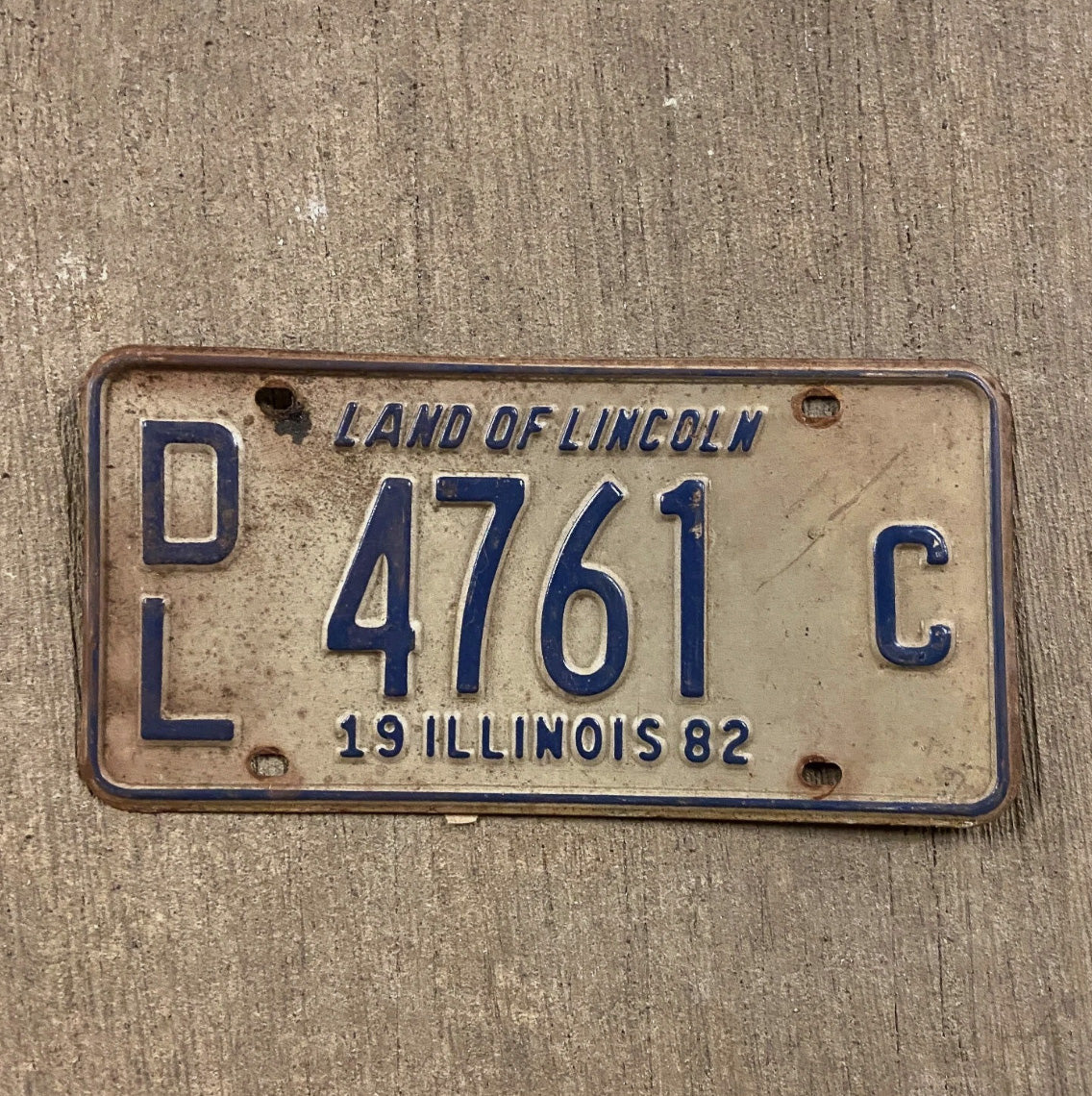 Photo of a 1982 Illinois Dealer License Plate Auto Tag Garage Decor Vintage 4761 C
