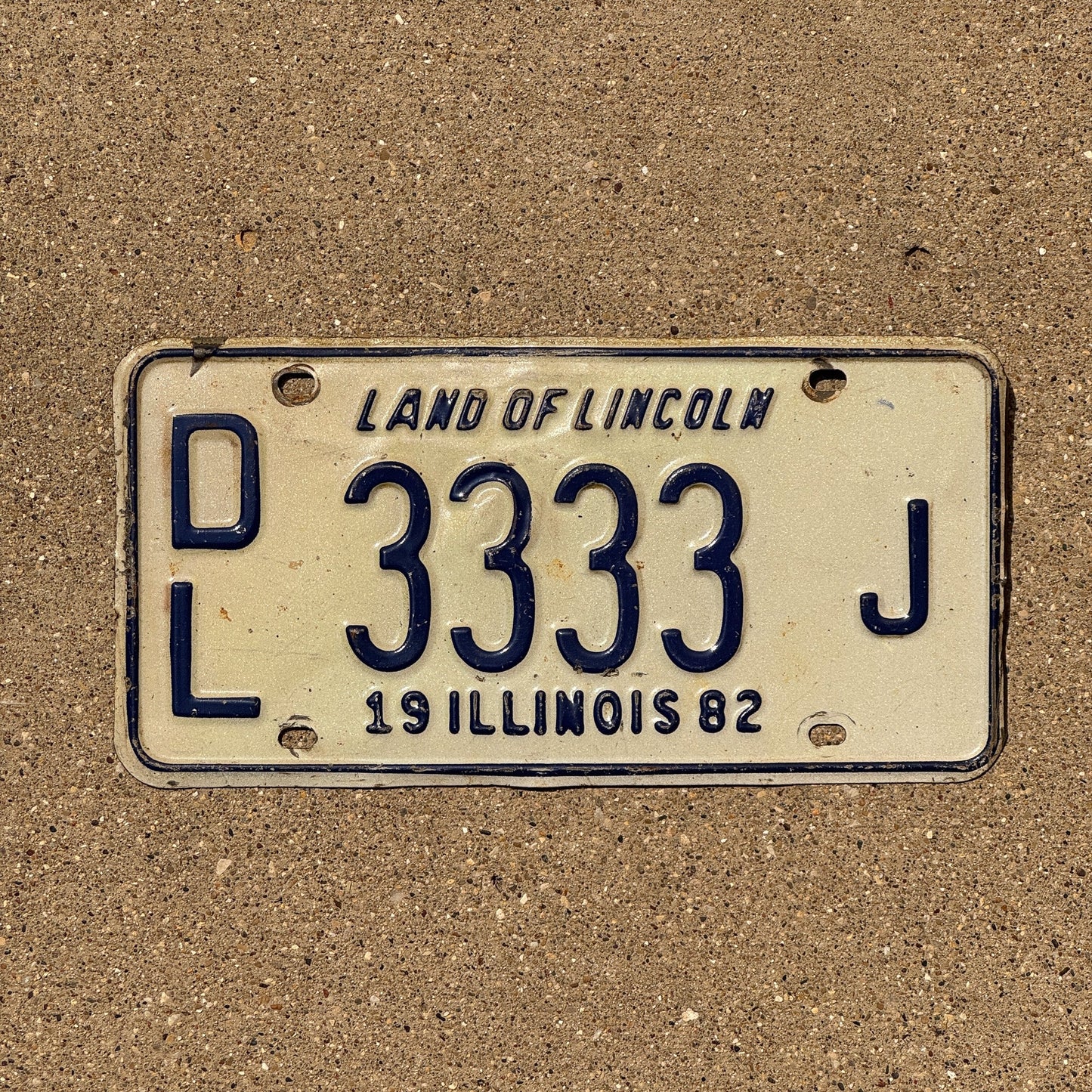 Photo of a 1982 Illinois Dealer License Plate Auto Tag Garage Decor Vintage Repeat Repeating DL 3333 J