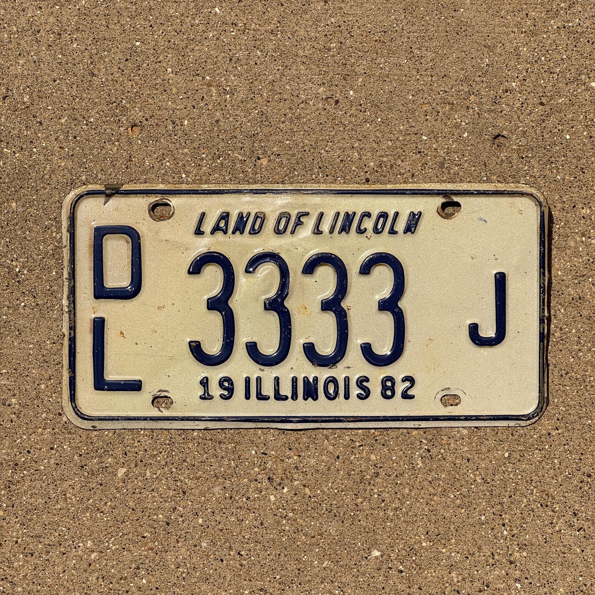 Photo of a 1982 Illinois Dealer License Plate Auto Tag Garage Decor Vintage Repeat Repeating DL 3333 J