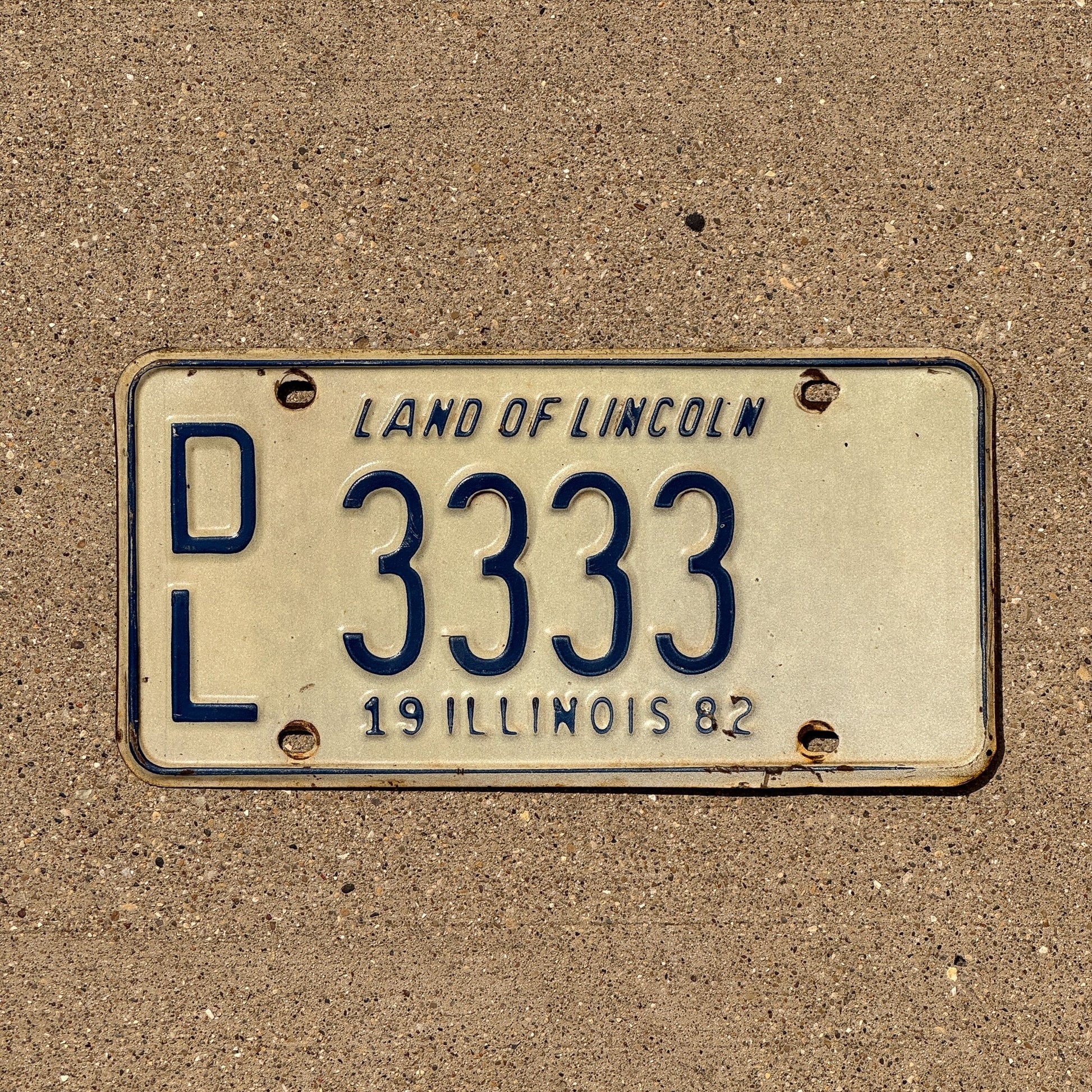 Photo of a 1982 Illinois Dealer License Plate Auto Tag Garage Decor Vintage Repeat Repeating DL 3333