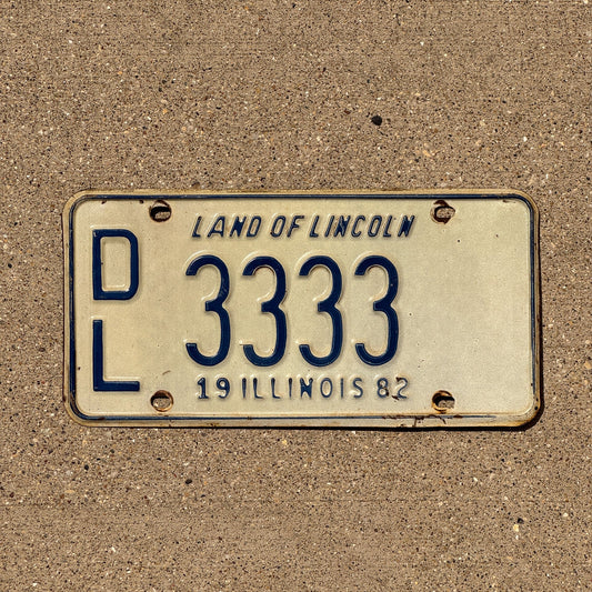 Photo of a 1982 Illinois Dealer License Plate Auto Tag Garage Decor Vintage Repeat Repeating DL 3333