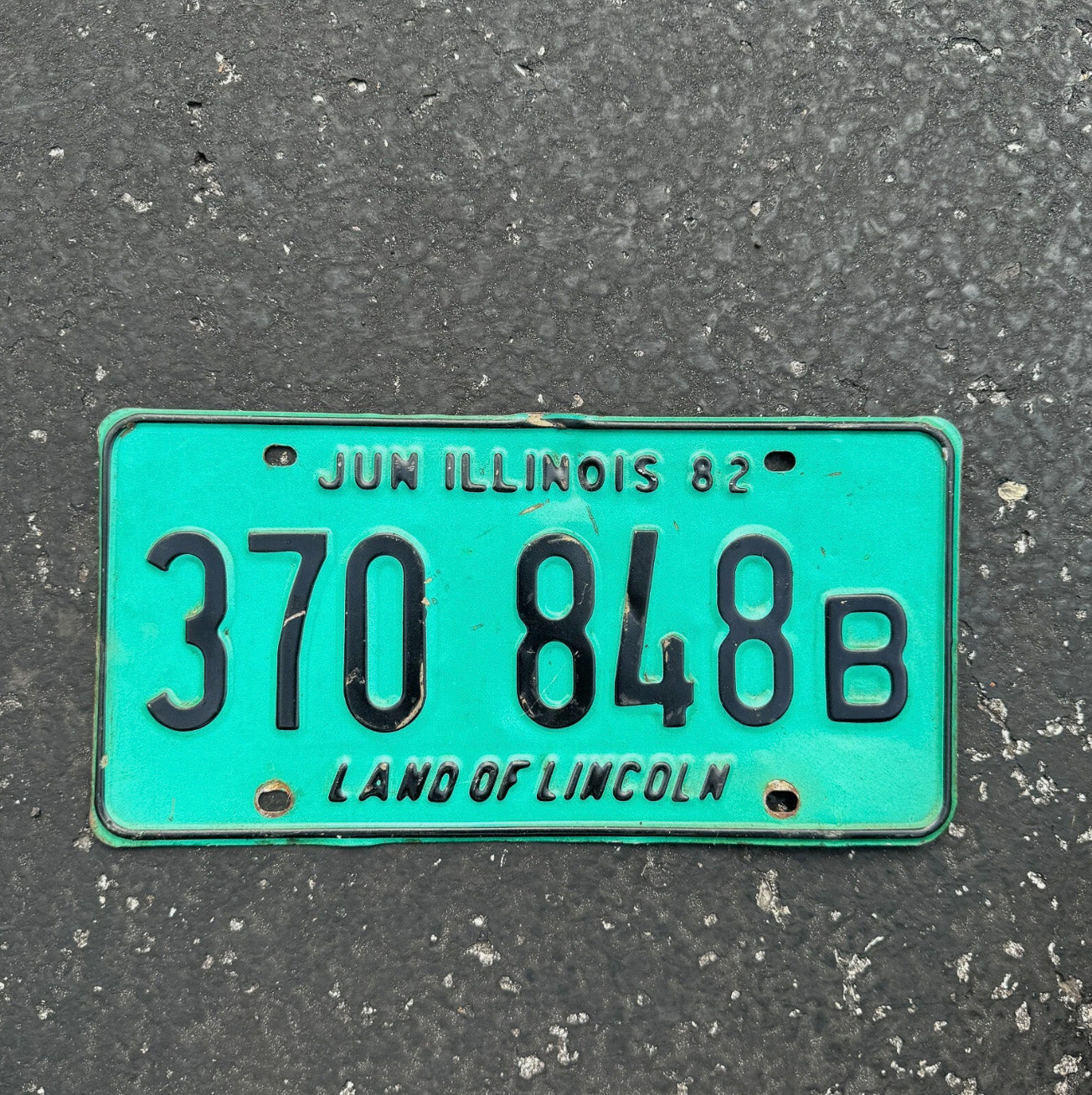 Photo of a 1982 Illinois Truck License Plate Auto Tag Garage Decor Vintage 370 848 B