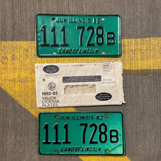 Photo of a 1982 Illinois Truck License Plate Pair Auto Tag Garage Decor Vintage Repeat Repeating 111 728 B with original patina