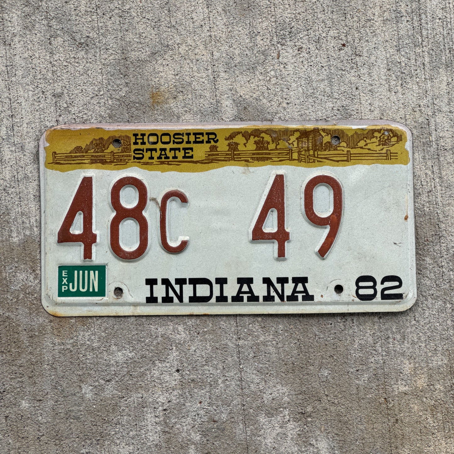 Photo of a 1982 Indiana License Plate Auto Tag Garage Decor Vintage 48 C 49 with original patina