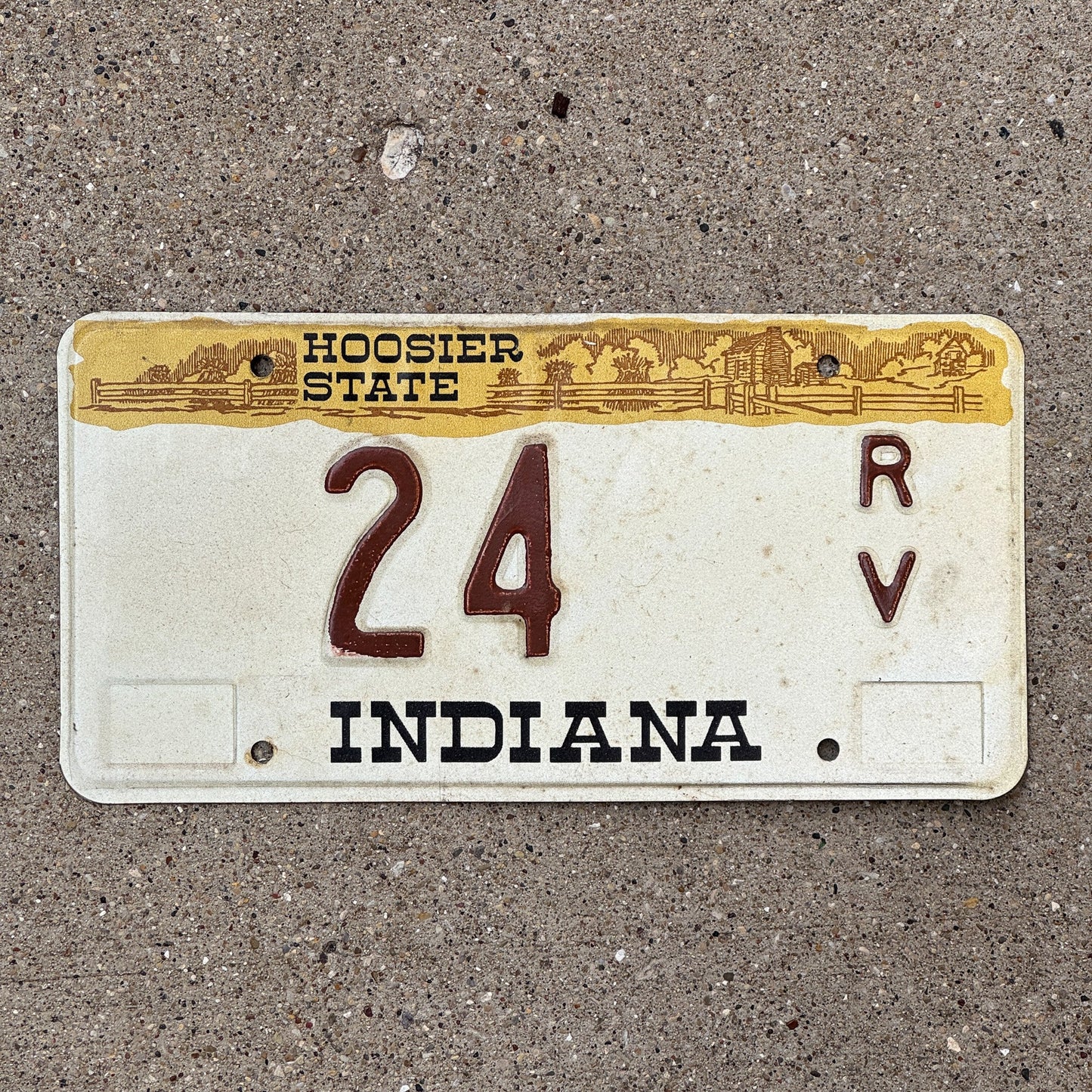 Photo of a 1982 Indiana RV License Plate Auto Tag Garage Decor Vintage 24