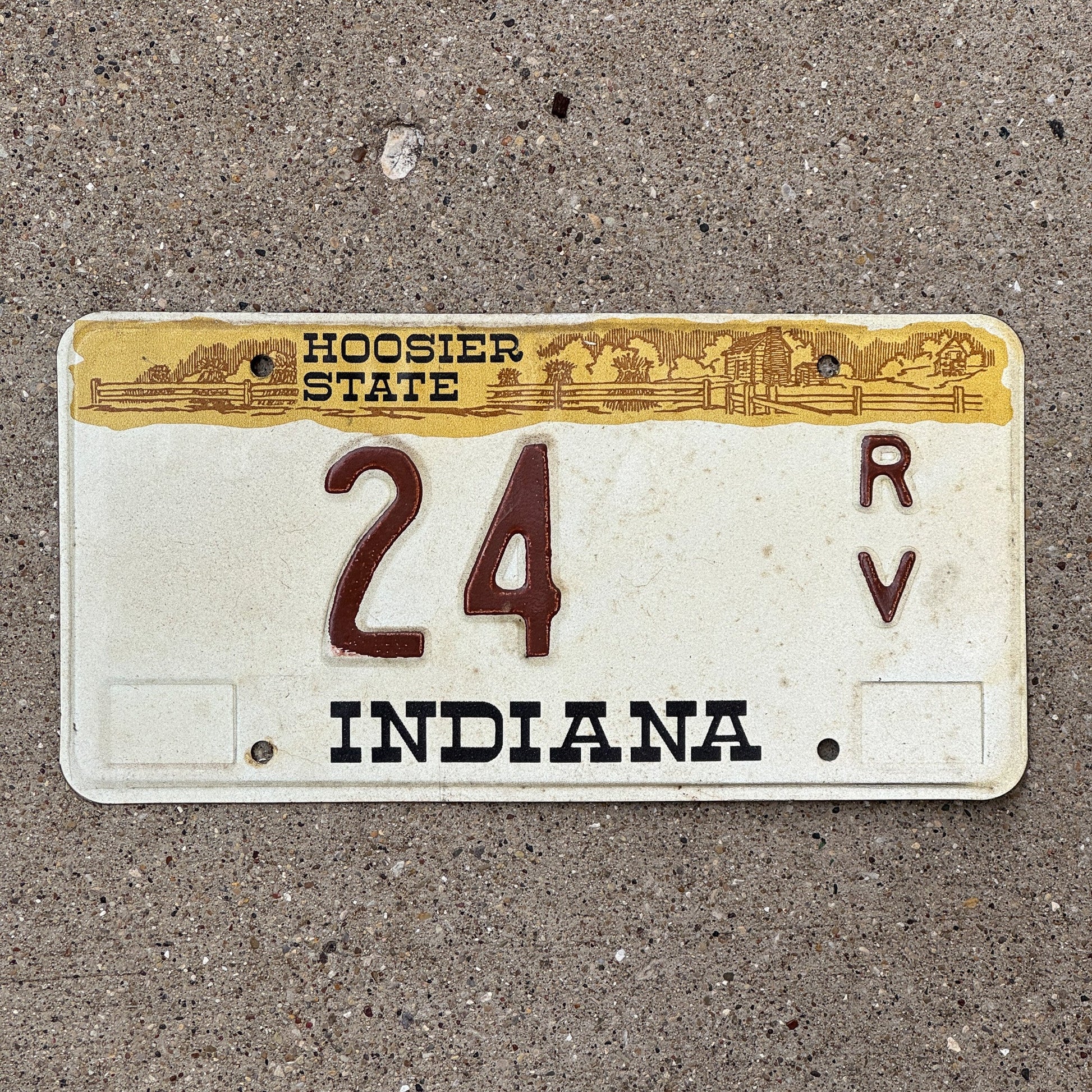 Photo of a 1982 Indiana RV License Plate Auto Tag Garage Decor Vintage 24