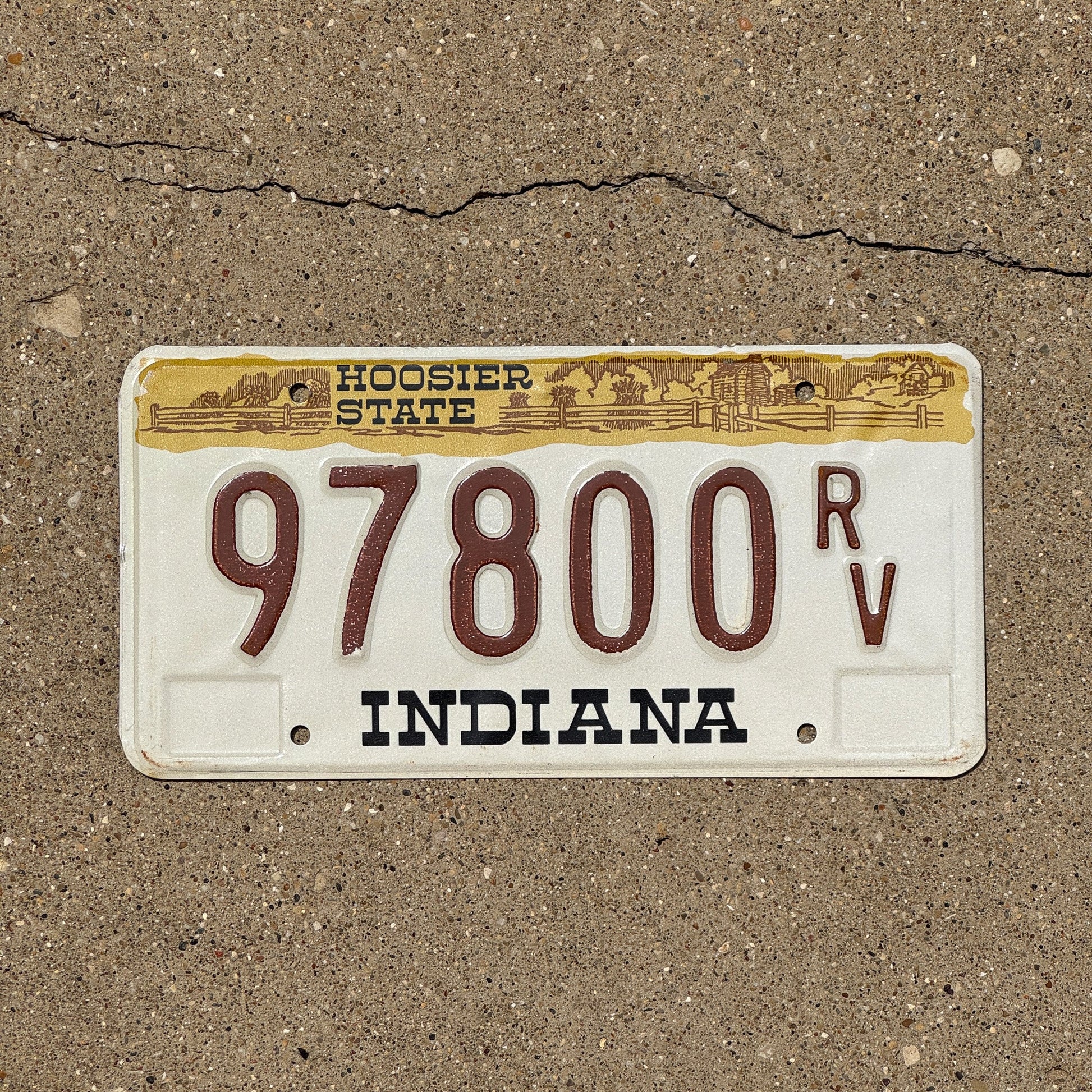 Photo of a 1982 Indiana RV License Plate Auto Tag Garage Decor Vintage 97800